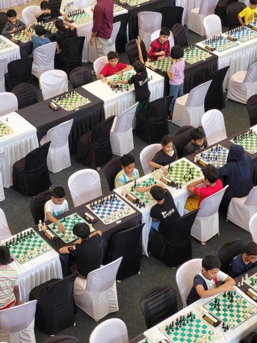 Young players at a chess tournament